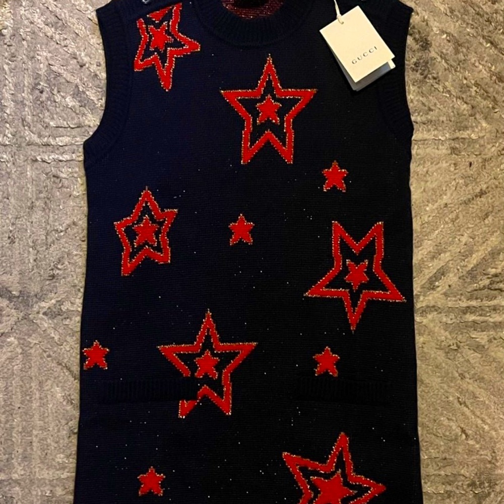 Size 10 kid Gucci star dress. Would fit a XS/S women New with tags